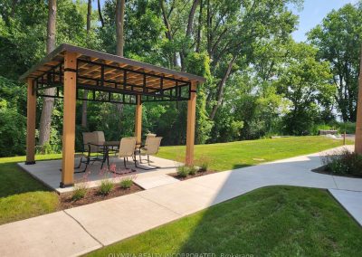 Outdoor gazebo and green space at Olympia on the Park